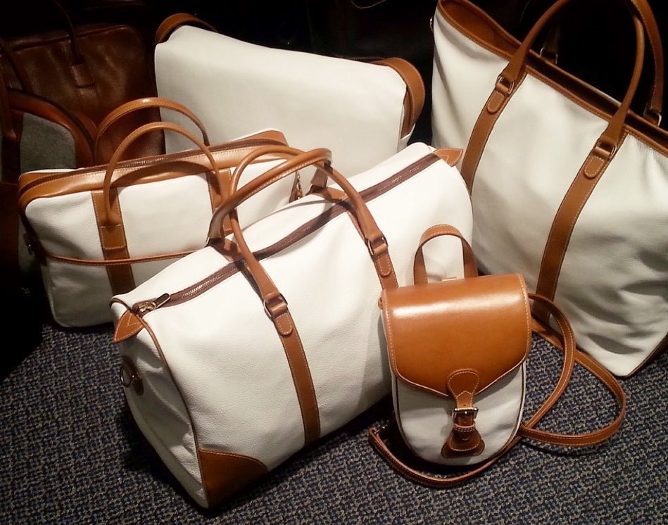 Custom branded Group of Bags, White Pebbled Leather for corporate gifting